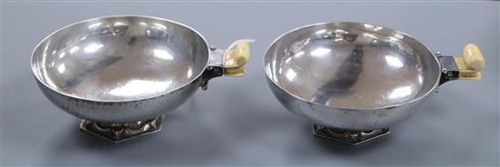 A stylish pair of George V Art Deco ivory handled circular bonbon dishes by Charles Boyton & Sons Ltd, London, 1931,